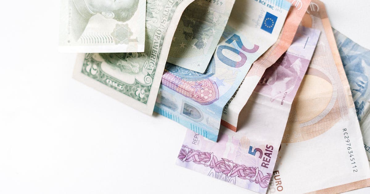 Chinese yuan banknotes spread out, representing China's digital currency developments